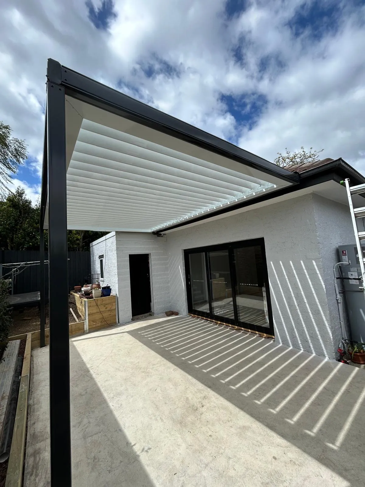 Modern louvred roof system Monument frame