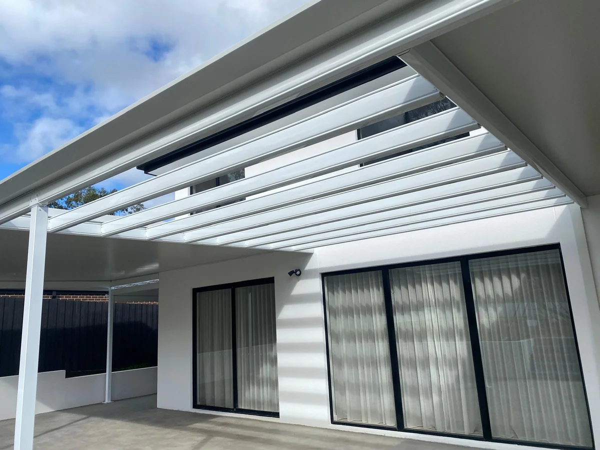 White pergola with louvred roof close-up